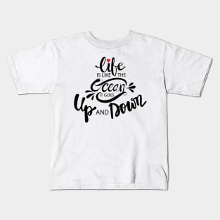 Life like the oceans it goes up and down hand lettering. Motivational quote. Kids T-Shirt